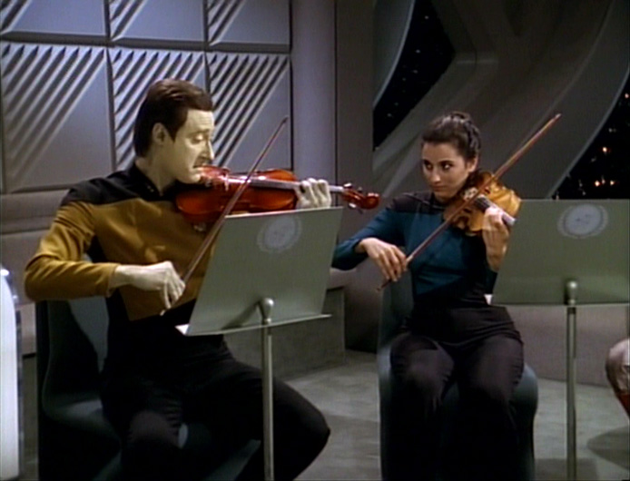 Data finding his inspiration playing the violin.